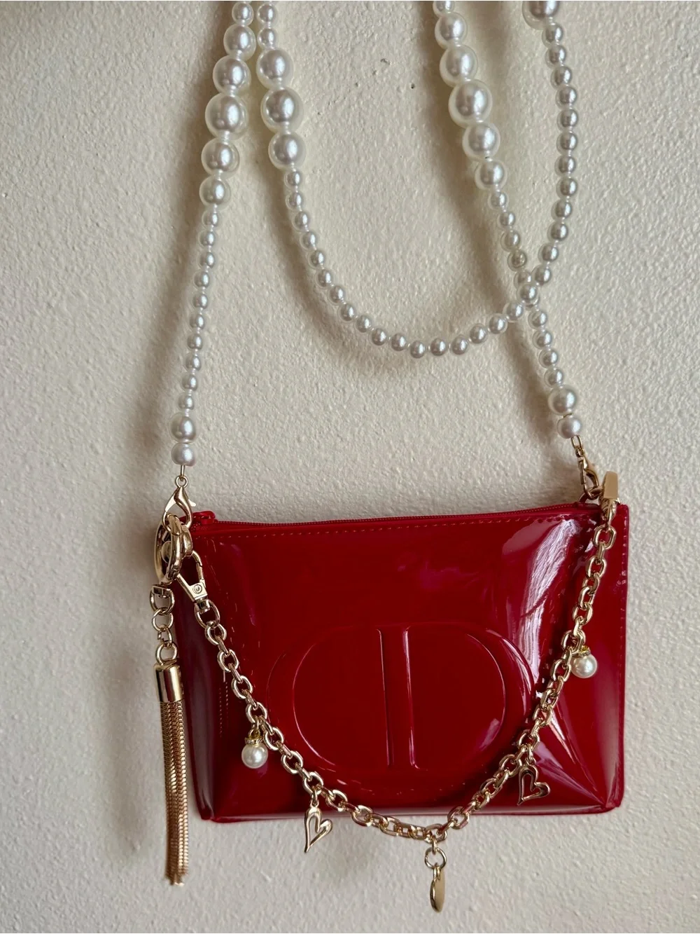 Dior Red Patent cosmetic pouch with gold hardware
